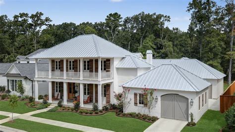 white houses with metal roofs|white standing seam metal roof.